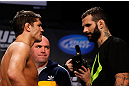 MONTREAL, CANADA - NOVEMBER 16:  (L-R) Opponents Patrick Cote and Alessio Sakara face off during the official UFC 154 weigh in at New City Gas on November 16, 2012 in Montreal, Quebec, Canada.  (Photo by Josh Hedges/Zuffa LLC/Zuffa LLC via Getty Images)