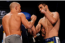 MONTREAL, CANADA - NOVEMBER 16: (L-R) Opponents Georges St-Pierre and Carlos Condit face off during the official UFC 154 weigh in at New City Gas on November 16, 2012 in Montreal, Quebec, Canada. (Photo by Josh Hedges/Zuffa LLC/Zuffa LLC via Getty Images)