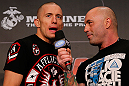 MONTREAL, CANADA - NOVEMBER 16: (R-L) Georges St-Pierre is interviewed by Joe Rogan after making weight during the official UFC 154 weigh in at New City Gas on November 16, 2012 in Montreal, Quebec, Canada. (Photo by Josh Hedges/Zuffa LLC/Zuffa LLC via Getty Images)
