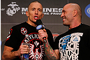 MONTREAL, CANADA - NOVEMBER 16: (R-L) Georges St-Pierre is interviewed by Joe Rogan after making weight during the official UFC 154 weigh in at New City Gas on November 16, 2012 in Montreal, Quebec, Canada. (Photo by Josh Hedges/Zuffa LLC/Zuffa LLC via Getty Images)