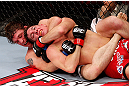 MONTREAL, QC - NOVEMBER 17:  Darren Elkins (white shorts) fights against Steven Siler in their featherweight bout during UFC 154 on November 17, 2012  at the Bell Centre in Montreal, Canada.  (Photo by Josh Hedges/Zuffa LLC/Zuffa LLC via Getty Images)