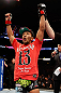 MONTREAL, QC - NOVEMBER 17:  Ivan Menjivar celebrates after defeating Azamat Gashimov to win their bantamweight bout during UFC 154 on November 17, 2012  at the Bell Centre in Montreal, Canada.  (Photo by Josh Hedges/Zuffa LLC/Zuffa LLC via Getty Images)