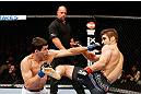 MONTREAL, QC - NOVEMBER 17:  Rodrigo Damm (L) fights against Antonio Carvalho in their featherweight bout during UFC 154 on November 17, 2012  at the Bell Centre in Montreal, Canada.  (Photo by Josh Hedges/Zuffa LLC/Zuffa LLC via Getty Images)