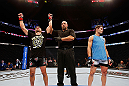MONTREAL, QC - NOVEMBER 17:  Antonio Carvalho (L) celebrates after winning a in a split decision against Rodrigo Damm in their featherweight bout during UFC 154 on November 17, 2012  at the Bell Centre in Montreal, Canada.  (Photo by Josh Hedges/Zuffa LLC/Zuffa LLC via Getty Images)