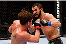 MONTREAL, QC - NOVEMBER 17:  John Makdessi (R) throws a punch against Sam Stout in their lightweight bout during UFC 154 on November 17, 2012  at the Bell Centre in Montreal, Canada.  (Photo by Josh Hedges/Zuffa LLC/Zuffa LLC via Getty Images)