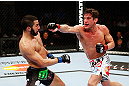 MONTREAL, QC - NOVEMBER 17:  Sam Stout (R) throws a punch against John Makdessi in their lightweight bout during UFC 154 on November 17, 2012  at the Bell Centre in Montreal, Canada.  (Photo by Josh Hedges/Zuffa LLC/Zuffa LLC via Getty Images)