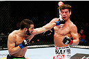 MONTREAL, QC - NOVEMBER 17:  John Makdessi (L) throws a punch against Sam Stout in their lightweight bout during UFC 154 on November 17, 2012  at the Bell Centre in Montreal, Canada.  (Photo by Josh Hedges/Zuffa LLC/Zuffa LLC via Getty Images)