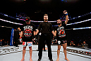 MONTREAL, QC - NOVEMBER 17:  John Makdessi (R) celebrates after winning on a split decision against Sam Stout in their lightweight bout during UFC 154 on November 17, 2012  at the Bell Centre in Montreal, Canada.  (Photo by Josh Hedges/Zuffa LLC/Zuffa LLC via Getty Images)