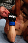 MONTREAL, QC - NOVEMBER 17:  Chad Griggs tries to defend himself while on his back against Cyrille Diabate in their light heavyweight bout during UFC 154 on November 17, 2012  at the Bell Centre in Montreal, Canada.  (Photo by Josh Hedges/Zuffa LLC/Zuffa LLC via Getty Images)