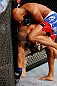 MONTREAL, QC - NOVEMBER 17:  Cyrille Diabate  throws a knee to the head of Chad Griggs in their light heavyweight bout during UFC 154 on November 17, 2012  at the Bell Centre in Montreal, Canada.  (Photo by Josh Hedges/Zuffa LLC/Zuffa LLC via Getty Images)