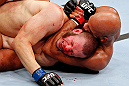 MONTREAL, QC - NOVEMBER 17:  Chad Griggs (L) taps out after being put in a choke hold by Cyrille Diabate in their light heavyweight bout during UFC 154 on November 17, 2012  at the Bell Centre in Montreal, Canada.  (Photo by Josh Hedges/Zuffa LLC/Zuffa LLC via Getty Images)