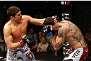 MONTREAL, QC - NOVEMBER 17:  Alessio Sakara (R) fights against Patrick Cote in their middleweight bout during UFC 154 on November 17, 2012  at the Bell Centre in Montreal, Canada.  (Photo by Josh Hedges/Zuffa LLC/Zuffa LLC via Getty Images)