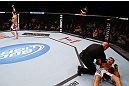 MONTREAL, QC - NOVEMBER 17:  Referee Dan Miragliotta calls the fight after Alessio Sakara (L) punched Patrick Cote in the back of the head multiple times during their middleweight bout during UFC 154 on November 17, 2012  at the Bell Centre in Montreal, Canada. Sakara was later disqualified for the illegal punches.  (Photo by Josh Hedges/Zuffa LLC/Zuffa LLC via Getty Images)