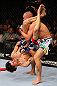 MONTREAL, QC - NOVEMBER 17:  Pablo Garza (L) grapples against Mark Hominick in their featherweight bout during UFC 154 on November 17, 2012  at the Bell Centre in Montreal, Canada.  (Photo by Josh Hedges/Zuffa LLC/Zuffa LLC via Getty Images)