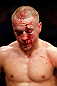 MONTREAL, QC - NOVEMBER 17:  A cut and bloodied Mark Hominick looks on while fight against Pablo Garza during their featherweight bout during UFC 154 on November 17, 2012  at the Bell Centre in Montreal, Canada.  (Photo by Josh Hedges/Zuffa LLC/Zuffa LLC via Getty Images)