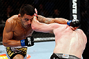 MONTREAL, QC - NOVEMBER 17:  Rafael dos Anjos (L) and Mark Bocek trade punches during their lightweight bout during UFC 154 on November 17, 2012  at the Bell Centre in Montreal, Canada.  (Photo by Josh Hedges/Zuffa LLC/Zuffa LLC via Getty Images)