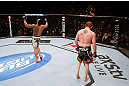 MONTREAL, QC - NOVEMBER 17:  Rafael dos Anjos (L) reacts after fighting against Mark Bocek in their lightweight bout during UFC 154 on November 17, 2012  at the Bell Centre in Montreal, Canada.  (Photo by Josh Hedges/Zuffa LLC/Zuffa LLC via Getty Images)