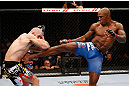 MONTREAL, QC - NOVEMBER 17:  Tom Lawlor (L) fights against Francis Carmont in their middleweight bout during UFC 154 on November 17, 2012  at the Bell Centre in Montreal, Canada.  (Photo by Josh Hedges/Zuffa LLC/Zuffa LLC via Getty Images)