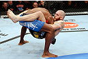 MONTREAL, QC - NOVEMBER 17:  Tom Lawlor (R) grapples against Francis Carmont in their middleweight bout during UFC 154 on November 17, 2012  at the Bell Centre in Montreal, Canada.  (Photo by Josh Hedges/Zuffa LLC/Zuffa LLC via Getty Images)