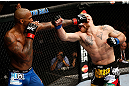 MONTREAL, QC - NOVEMBER 17:  Tom Lawlor (R) fights against Francis Carmont in their middleweight bout during UFC 154 on November 17, 2012  at the Bell Centre in Montreal, Canada.  (Photo by Josh Hedges/Zuffa LLC/Zuffa LLC via Getty Images)