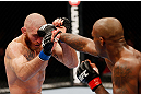 MONTREAL, QC - NOVEMBER 17:  Tom Lawlorfails to block the punch of Francis Carmont during their middleweight bout during UFC 154 on November 17, 2012  at the Bell Centre in Montreal, Canada.  (Photo by Josh Hedges/Zuffa LLC/Zuffa LLC via Getty Images)