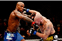MONTREAL, QC - NOVEMBER 17:  Tom Lawlor (R) trades punches with Francis Carmont during their middleweight bout during UFC 154 on November 17, 2012  at the Bell Centre in Montreal, Canada.  (Photo by Josh Hedges/Zuffa LLC/Zuffa LLC via Getty Images)