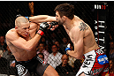 MONTREAL, QC - NOVEMBER 17:  Carlos Condit (R) thorws a punch against Georges St-Pierre in their welterweight title bout during UFC 154 on November 17, 2012  at the Bell Centre in Montreal, Canada.  (Photo by Josh Hedges/Zuffa LLC/Zuffa LLC via Getty Images)