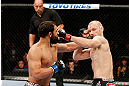 MONTREAL, QC - NOVEMBER 17:  Johny Hendricks (L) knocks out Martin Kampmann with a left in the first round to win their welterweight bout during UFC 154 on November 17, 2012  at the Bell Centre in Montreal, Canada.  (Photo by Josh Hedges/Zuffa LLC/Zuffa LLC via Getty Images)