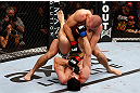 MONTREAL, QC - NOVEMBER 17:  Carlos Condit (bottom) grapples against Georges St-Pierre in their welterweight title bout during UFC 154 on November 17, 2012  at the Bell Centre in Montreal, Canada.  (Photo by Josh Hedges/Zuffa LLC/Zuffa LLC via Getty Images)