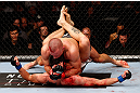 MONTREAL, QC - NOVEMBER 17:  Georges St-Pierre (top) grapples against Carlos Condit in their welterweight title bout during UFC 154 on November 17, 2012  at the Bell Centre in Montreal, Canada.  (Photo by Josh Hedges/Zuffa LLC/Zuffa LLC via Getty Images)