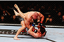 MONTREAL, QC - NOVEMBER 17:  Georges St-Pierre throws a punch to the face of Carlos Condit in their welterweight title bout during UFC 154 on November 17, 2012  at the Bell Centre in Montreal, Canada.  (Photo by Josh Hedges/Zuffa LLC/Zuffa LLC via Getty Images)
