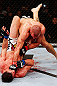 MONTREAL, QC - NOVEMBER 17:  Georges St-Pierre throws a punch to the face of Carlos Condit in their welterweight title bout during UFC 154 on November 17, 2012  at the Bell Centre in Montreal, Canada.  (Photo by Josh Hedges/Zuffa LLC/Zuffa LLC via Getty Images)
