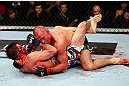 MONTREAL, QC - NOVEMBER 17:  Georges St-Pierre (top) grapples against Carlos Condit in their welterweight title bout during UFC 154 on November 17, 2012  at the Bell Centre in Montreal, Canada.  (Photo by Josh Hedges/Zuffa LLC/Zuffa LLC via Getty Images)