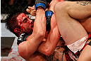 MONTREAL, QC - NOVEMBER 17:  Carlos Condit (L) grapples against Georges St-Pierre in their welterweight title bout during UFC 154 on November 17, 2012  at the Bell Centre in Montreal, Canada.  (Photo by Josh Hedges/Zuffa LLC/Zuffa LLC via Getty Images)