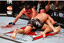 MONTREAL, QC - NOVEMBER 17:  Carlos Condit (L) grapples against Georges St-Pierre in their welterweight title bout during UFC 154 on November 17, 2012  at the Bell Centre in Montreal, Canada.  (Photo by Josh Hedges/Zuffa LLC/Zuffa LLC via Getty Images)