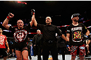 MONTREAL, QC - NOVEMBER 17:  Georges St-Pierre (L) reacts after winning his fight against Carlos Condit by a unanimous decision to retain his welterweight title during UFC 154 on November 17, 2012  at the Bell Centre in Montreal, Canada.  (Photo by Josh Hedges/Zuffa LLC/Zuffa LLC via Getty Images)