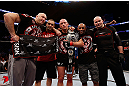 MONTREAL, QC - NOVEMBER 17:  Georges St-Pierre celebrates with his team after defeating Carlos Condit by a unanimous decision to retain his welterweight title during UFC 154 on November 17, 2012  at the Bell Centre in Montreal, Canada.  (Photo by Josh Hedges/Zuffa LLC/Zuffa LLC via Getty Images)