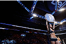 MONTREAL, QC - NOVEMBER 17:  UFC Octagon Girl Arianny Celeste introduces a round during UFC 154 on November 17, 2012  at the Bell Centre in Montreal, Canada.  (Photo by Josh Hedges/Zuffa LLC/Zuffa LLC via Getty Images)