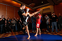 SEATTLE, WA - DECEMBER 05:  Rory MacDonald works out for fans and media during the UFC on FOX open workouts on December 5, 2012  at the Grand Hyatt Seattle in Seattle, Washington.  (Photo by Josh Hedges/Zuffa LLC/Zuffa LLC via Getty Images)