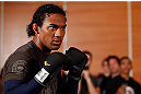 SEATTLE, WA - DECEMBER 05:  Benson Henderson works out for fans and media during the UFC on FOX open workouts on December 5, 2012  at the Grand Hyatt Seattle in Seattle, Washington.  (Photo by Josh Hedges/Zuffa LLC/Zuffa LLC via Getty Images)