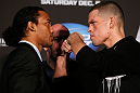 SEATTLE, WA - DECEMBER 06:  (L-R) Opponents Benson Henderson and Nate Diaz face off during the UFC on FOX press conference on December 6, 2012 at Key Arena in Seattle, Washington.  (Photo by Josh Hedges/Zuffa LLC/Zuffa LLC via Getty Images)