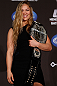 SEATTLE, WA - DECEMBER 06:  Ronda Rousey poses for photos after being presented with the UFC women's bantamweight championship during the UFC on FOX press conference on December 6, 2012 at Key Arena in Seattle, Washington.  (Photo by Josh Hedges/Zuffa LLC/Zuffa LLC via Getty Images)