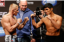 SEATTLE, WA - DECEMBER 07:  (L-R) Opponents Dennis Siver and Nam Phan face off during the official UFC on FOX weigh in on December 7, 2012 at Key Arena in Seattle, Washington.  (Photo by Josh Hedges/Zuffa LLC/Zuffa LLC via Getty Images)