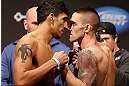 SEATTLE, WA - DECEMBER 07:  (L-R) Opponents Ramsey Nijem and Joe Proctor face off during the official UFC on FOX weigh in on December 7, 2012 at Key Arena in Seattle, Washington.  (Photo by Josh Hedges/Zuffa LLC/Zuffa LLC via Getty Images)