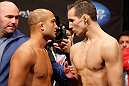 SEATTLE, WA - DECEMBER 07:  (L-R) Opponents BJ Penn and Rory MacDonald face off during the official UFC on FOX weigh in on December 7, 2012 at Key Arena in Seattle, Washington.  (Photo by Josh Hedges/Zuffa LLC/Zuffa LLC via Getty Images)