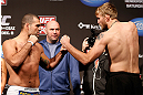 SEATTLE, WA - DECEMBER 07:  (L-R) Opponents Mauricio "Shogun" Rua and Alexander Gustafsson face off during the official UFC on FOX weigh in on December 7, 2012 at Key Arena in Seattle, Washington.  (Photo by Josh Hedges/Zuffa LLC/Zuffa LLC via Getty Images)