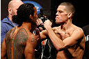 SEATTLE, WA - DECEMBER 07:  (L-R) Opponents Benson Henderson and Nate Diaz face off during the official UFC on FOX weigh in on December 7, 2012 at Key Arena in Seattle, Washington.  (Photo by Josh Hedges/Zuffa LLC/Zuffa LLC via Getty Images)