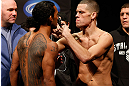 SEATTLE, WA - DECEMBER 07:  (L-R) Opponents Benson Henderson and Nate Diaz face off during the official UFC on FOX weigh in on December 7, 2012 at Key Arena in Seattle, Washington.  (Photo by Josh Hedges/Zuffa LLC/Zuffa LLC via Getty Images)
