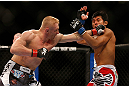 SEATTLE, WA - DECEMBER 08:  (L-R) Dennis Siver punches Nam Phan during their featherweight bout at the UFC on FOX event on December 8, 2012  at Key Arena in Seattle, Washington.  (Photo by Josh Hedges/Zuffa LLC/Zuffa LLC via Getty Images) *** Local Caption *** Dennis Siver; Nam Phan