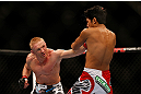 SEATTLE, WA - DECEMBER 08:  (L-R) Dennis Siver punches Nam Phan during their featherweight bout at the UFC on FOX event on December 8, 2012  at Key Arena in Seattle, Washington.  (Photo by Josh Hedges/Zuffa LLC/Zuffa LLC via Getty Images) *** Local Caption *** Dennis Siver; Nam Phan